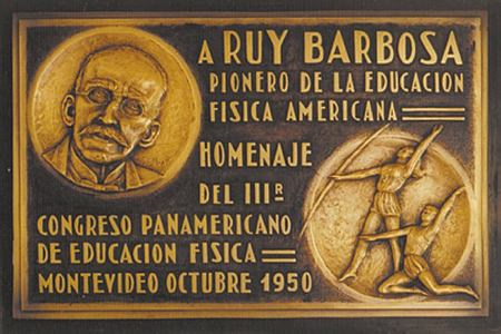 Placa de bronze com dois medalhões: com a efígie de Rui Barbosa e as figuras de dois atletas. Outubro de 1950.